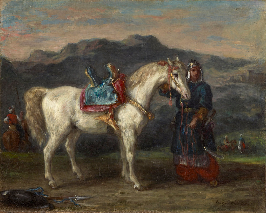 Circassian holding a horse by its bridle
